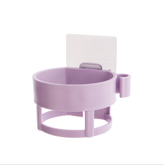Space-saving bathroom hair dryer storage with adhesive mount