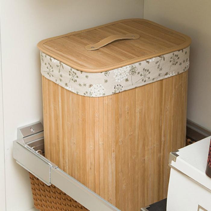 Lidded bamboo basket for blankets toys and household essentials