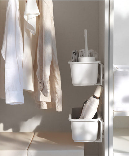 Space-saving wall storage unit for under sink organisation