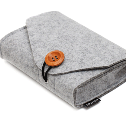 Under mattress bed organiser for books phones and chargers