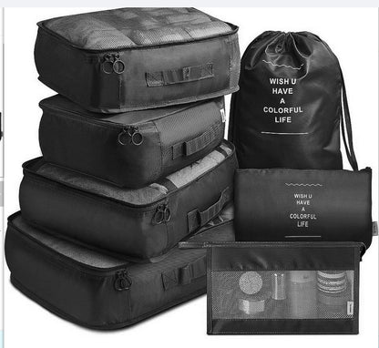 Eight-piece travel packing cube set for organised luggage