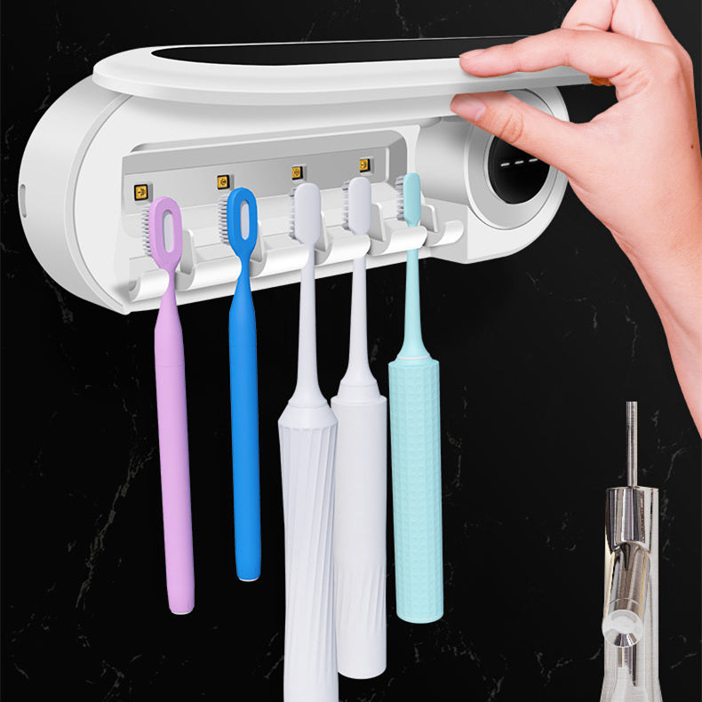 Bathroom organiser for toothbrushes and toothpaste with UV light