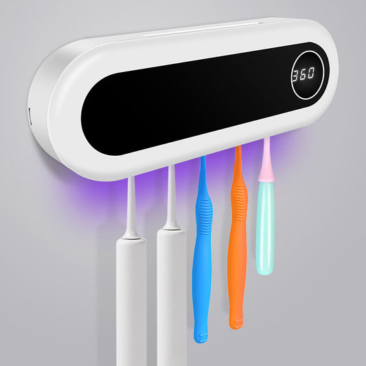 Wall-mounted UV toothbrush holder with automatic toothpaste dispenser