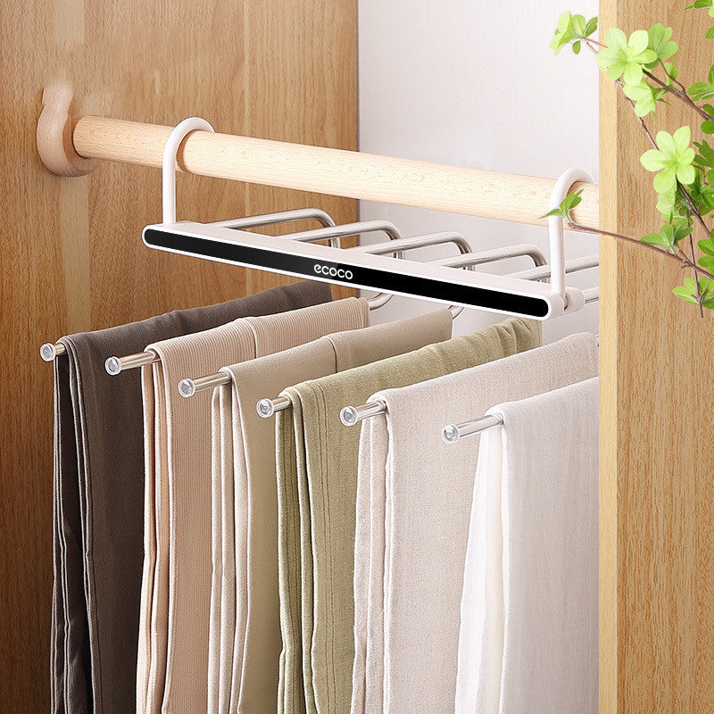 Foldable multi-layer trouser hanger with retractable arms