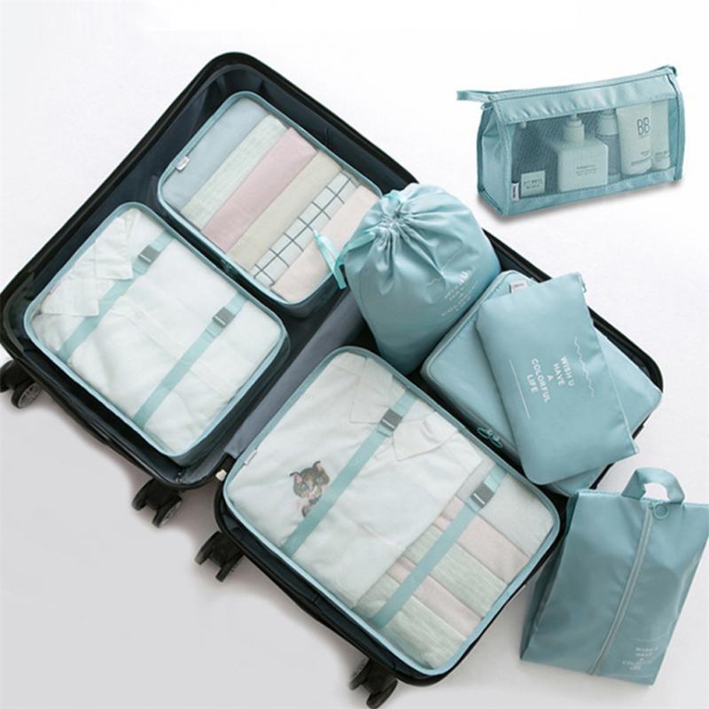 Eight-piece travel packing cube set for organised luggage