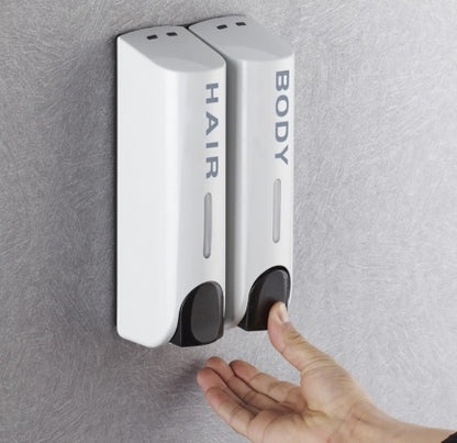 Black wall-mounted soap and shampoo dispenser for bathroom use
