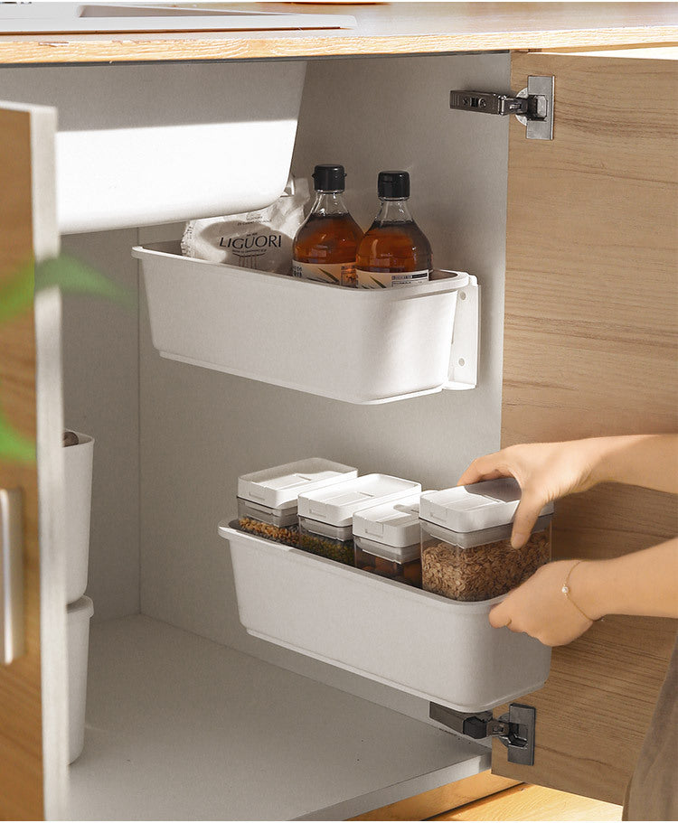 Compact sink organiser for cleaning supplies and toiletries