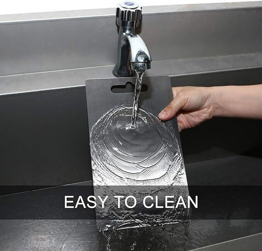 Reversible stainless steel cutting board for food preparation
